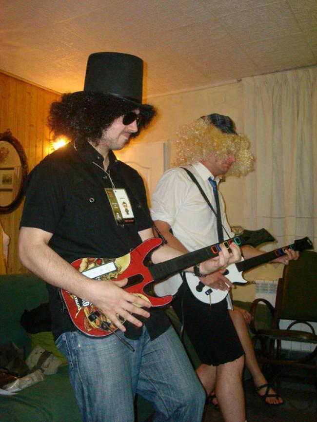 Slash Vs Angus Young