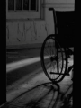 Figura en silla de ruedas